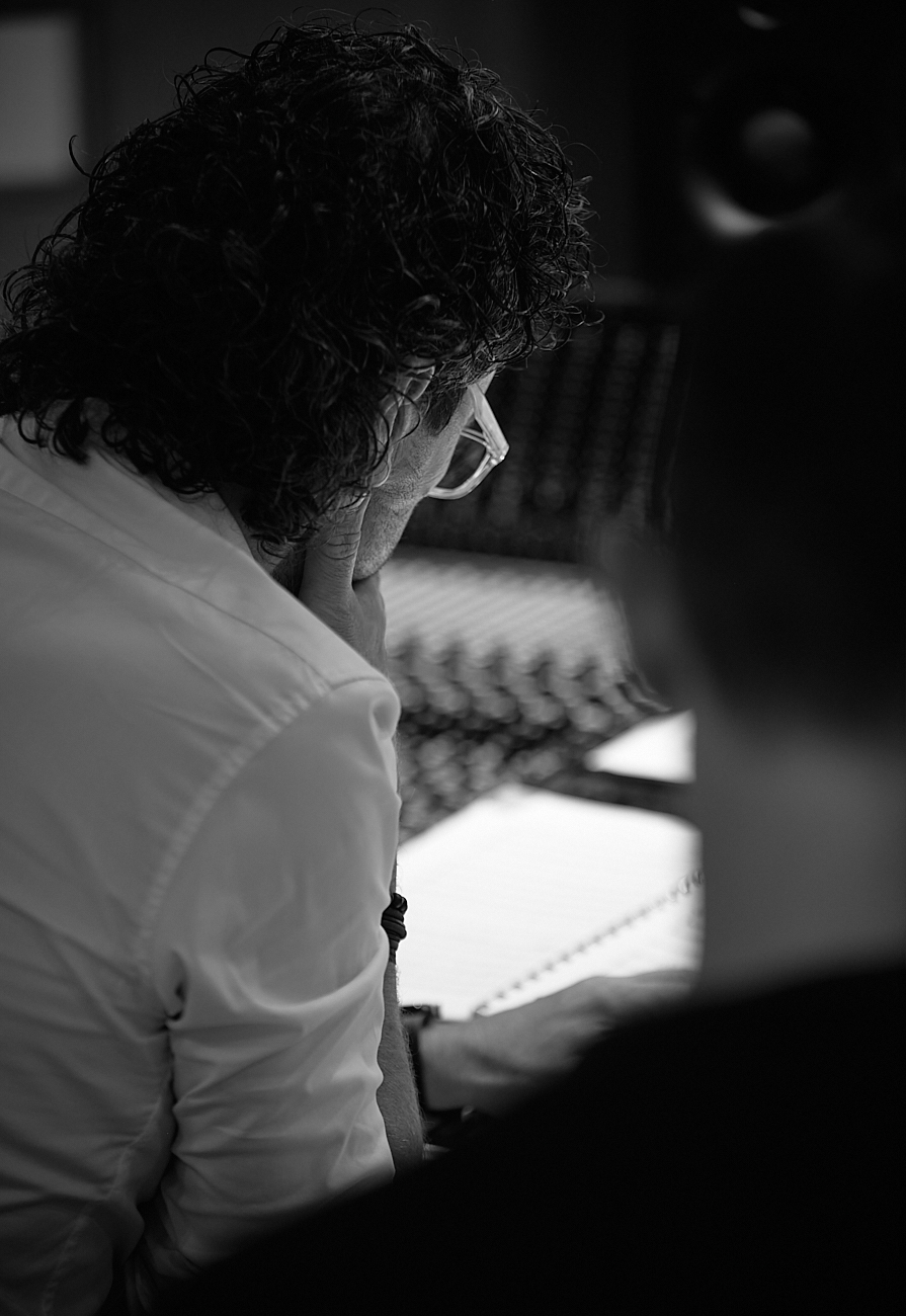 Paul Lorenz studying a score at the console